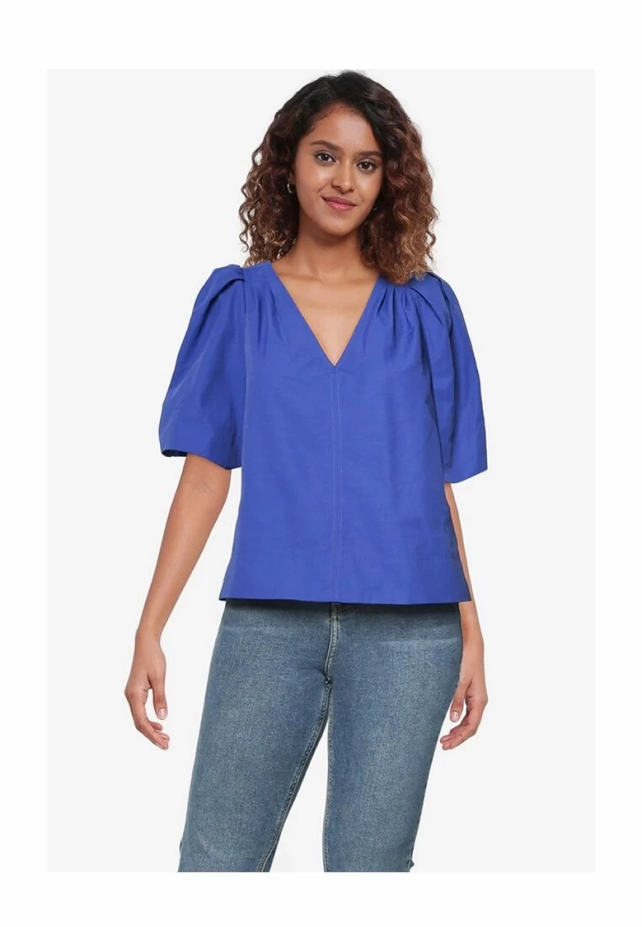 "Architectural Puff Sleeve Blouse for Women - Trendy Statement Top"